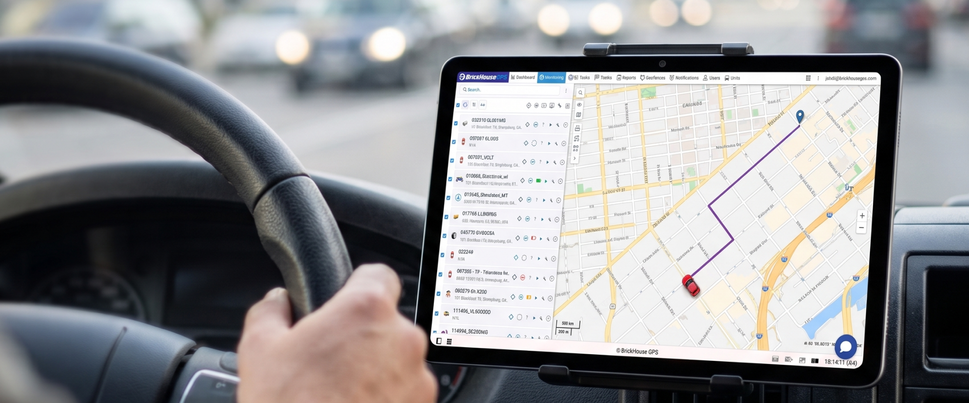 "Driver viewing a live route map on a dashboard tablet, demonstrating fleet route optimization through the BrickHouse GPS platform